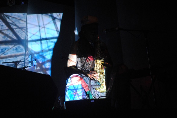 Playing in darkness as projections rolled behind her, Matana Roberts previewed work from the next chapter of her multi-media conceptual project 'COIN COIN' at The Great Hall as part of the Constellation Records showcase. Photo: Tom Beedham